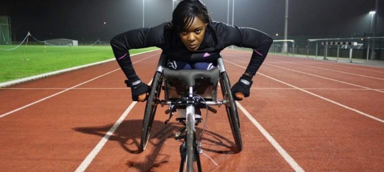 a female athlete in her wheelchair